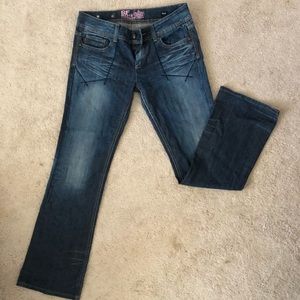 Women’s boot cut RCrock express blue jeans.